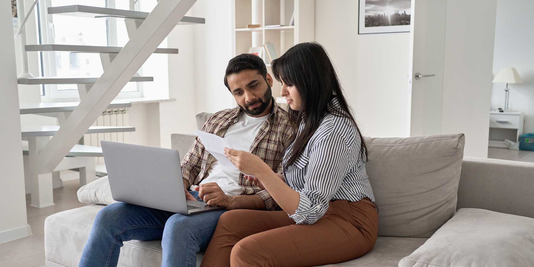 A couple exploring the differences between personal and home equity loans